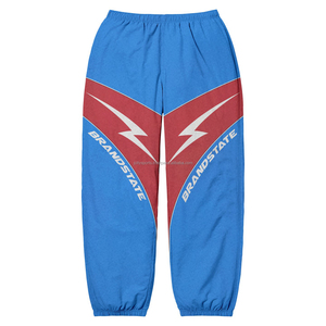 Pantalones deportivos para correr de alta calidad al por mayor, pantalones cortavientos holgados reflectantes, pantalones de costura informales para mujer de alta calidad - Product Image 5