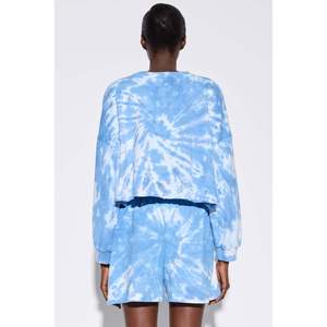 กางเกงขาสั้นผ้าบาติกแบบมีกระเป๋า - Product Image 5