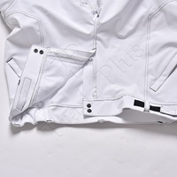 Pantalon de ski chauffant blanc imperméable grande taille de haute qualité avec fermeture à cordon et poches cargo pour activités de neige en extérieur