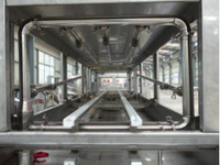 Laveuse de cages automatique pour poulets, paniers, caisses et plateaux de ferme