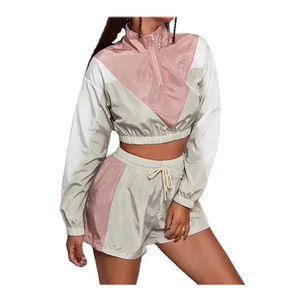 OEM Ensemble de haute qualité pour femmes Ensemble short coupe-vent en polyester 100% pour femmes Ensemble solide de 2 pièces pour femmes Quickdry Respirant - Product Image 1