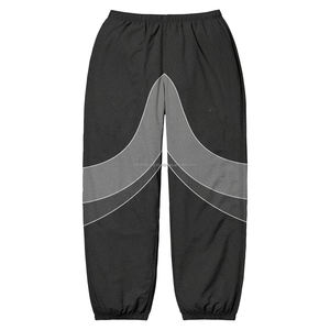 Personalizado Casual impermeable al aire libre rompevientos pantalones de poliéster bordado en blanco pantalones de chándal de nailon para mujeres de alta calidad - Product Image 5