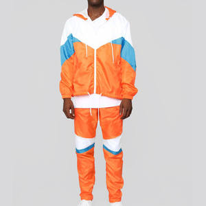 Veste de sport d'été personnalisée de haute qualité, ensemble de pantalons, dernière conception, survêtement de jogging coupe-vent respirant coloré pour hommes - Product Image 1