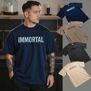 เสื้อยืดผ้าฝ้าย100% สำหรับผู้ชายเสื้อเชิ้ตแขนสั้นสีล้วนคอทรงหลวมคอตตอนสำหรับฤดูร้อน - Product Image 1