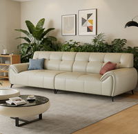 Canapé modulable en cuir contemporain haute résilience avec coussins moelleux, idéal pour salon ouvert