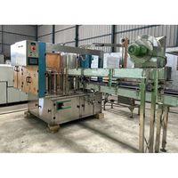 Machine de remplissage automatique d'eau PET 1000 ml, électrique 380 V, 1 buse, équipement de production de boissons, haute productivité