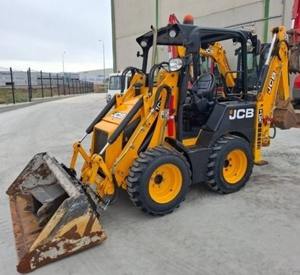 Chargeur compact JCB 1CX d'occasion propre, chargeur de tracteur, chargeur de 2 tonnes, pelle rétrocaveuse avec moteur et boîte de vitesses Caterpillar à vendre - Product Image 1
