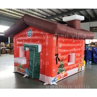 Maisons de Noël gonflables, tente gonflable publicitaire Père Noël, cabane gonflable pour la décoration d'événements