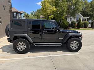 ข้อเสนอส่วนลด รถจี๊ป แรงเลอร์ อันลิมิเต็ด รูบิคอน 4x4 ปี 2015 มือสอง ไมล์น้อย - Product Image 5