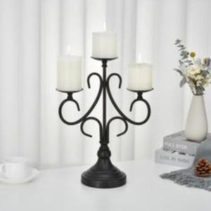 Elegante portavelas de hierro de mesa con una silueta contemporánea elegante y un acabado de metal envejecido industrial para un toque moderno - Product Image 1