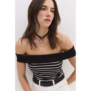 T-shirt sans manches à col rond uni - Product Image 1