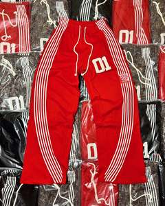 กางเกงแฟลร์ลายทาง สำหรับผู้ชายและผู้หญิง ผ้าฝ้ายฟลีซ ใส่ได้ในฤดูหนาว ดีไซน์ทันสมัย แต่งลายปะ ปักลายขาดๆ กางเกงวอร์มทรงแทร็ค - Product Image 1