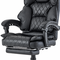 Chaise de bureau exécutive moderne en cuir PVC noir avec repose-pieds escamotable, dossier haut, accoudoirs rembourrés matelassés en losanges, idéale pour l'école