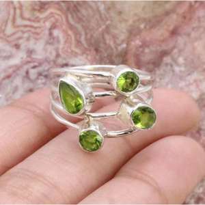 แหวนพลอยเพอริโดสีเขียวสี่ชิ้นแหวนของขวัญสุดหรูสำหรับผู้หญิงเด็กผู้หญิงเครื่องประดับเงินสเตอร์ลิง925งานแต่งงานขายส่งจำนวนมาก - Product Image 1