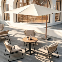 Ensemble de mobilier de jardin en rotin pour terrasse et hôtel, comprenant une table et 4 chaises en aluminium avec cordes élastiques, idéal pour l'extérieur et le jardin, à prix abordable.