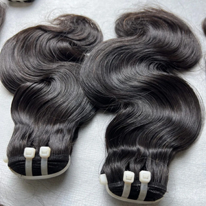 Venta al por mayor de doble dibujado cutícula alineada estilo rizado de encaje indio Remy paquetes de cabello de onda natural cruda virgen humano vietnamita proveedor - Product Image 1