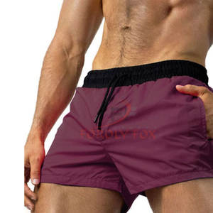Precio bajo Verano Logotipo personalizado Imprimir Hombres Verano Color sólido Playa Deportes Pantalones cortos Hombres Pantalones cortos de baño Hombres - Product Image 1