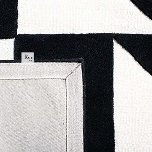 Tapis en laine monochrome abstrait à découpe en boucle avec formes graphiques audacieuses pour les intérieurs contemporains de salons et de chambres - Product Image 6