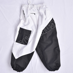 Pantalones de Nieve Impermeables de Moda 2025 en Blanco y Negro con Múltiples Bolsillos, Cintura con Cordón y Forro Cálido para Invierno - Product Image 2