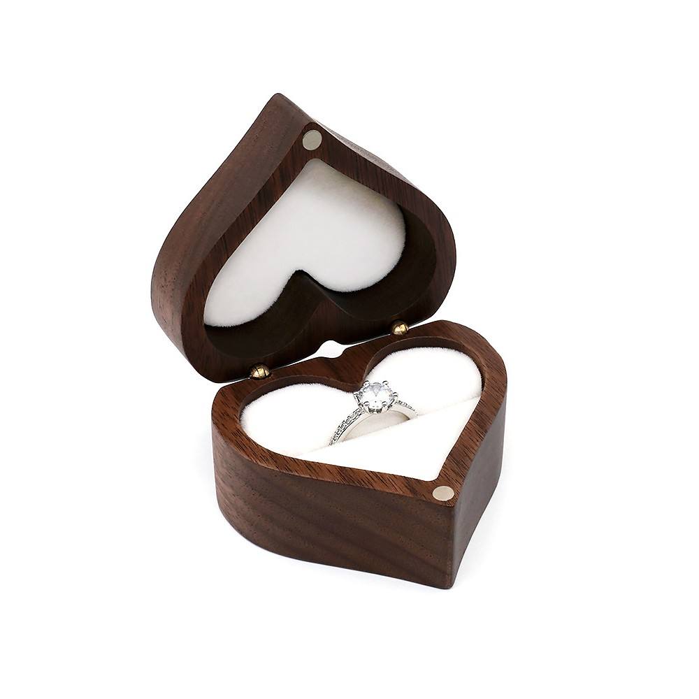 White heart shaped ring box