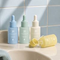 Flacon compte-gouttes en verre bleu mat 30 ml, flacon de sérum doux au toucher pour les soins de la peau Gen-Z, marque privée haut de gamme