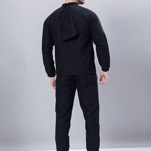 Conjunto Deportivo Negro para Hombre, Chaqueta con Cierre Completo y Cuello Alto con Detalles de Ribete Blanco Delgado y Pantalones Deportivos a Juego - Product Image 6