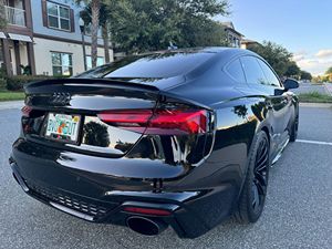 2021 ออดี้ อาร์เอส5 สปอร์ตแบ็ค รุ่นลอนช์ อิดิชั่น สีดำออปติก หลังคาซันรูฟแบบพาโนรามา เบาะหนัง เครื่องยนต์ทวินเทอร์โบ วี6 ล้อแม็กซ์ขนาด 20 นิ้ว เกียร์ 8 สปีด พวงมาลัยซ้าย ระบบขับเคลื่อนสี่ล้ออัตโนมัติ ระบบควบคุมความเร็วอัตโนมัติแบบแปรผัน ไฟ - Product Image 3