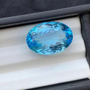 บลูโทแพซทรงรี เกรด AAA+ ฟรีไซส์ 100% ธรรมชาติ สำหรับงานแฮนด์เมด พลอยหลวมจาก Mehrajudin Gems น้ำหนัก 15.28 กะรัต สีโอปาเลสเซนต์ - Product Image 1