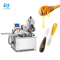 Machine de remplissage et de scellage de miel multifonctionnelle entièrement automatique à double tête rotative pour l'emballage du miel des petites entreprises