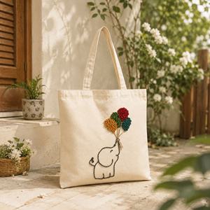 Bolsa de Lona Priglob Exim con Bordado de Elefante Hecho a Mano, Forro de Algodón, 14x16 Pulgadas y Diseño de Globos Coloridos - Product Image 1