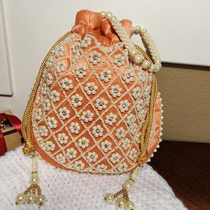 Beautiful Peach Color Raw Silk Potli <b>Bags</b> Embellished with Crystal Glass Beads Stones & Resham Embroidery <b>for</b> <b>Wedding</b> Party 2025 - Product Image 1