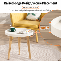 Table d'appoint ronde en bois minimaliste moderne avec plateau surélevé, compacte pour les intérieurs modernes et commerciaux