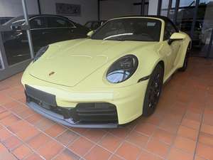 Porsche 911 Carrera Cabriolet / Sport Design 3.0L Essence 394 CV Hybride Max V6 Turbo 2024 d'occasion en excellent état, intérieur cuir foncé - Product Image 2