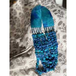 Collar de cuentas tropicales de seis hilos con borla para ocasiones festivas - Product Image 1