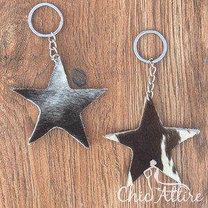 Nouveau concepteur vente chaude porte-clés en cuir de vachette vrais cheveux sur porte-clés en cuir élégant Unique en cuir véritable porte-clés de luxe - Product Image 1