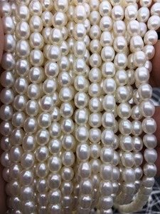 AAA de alta calidad 5,5-6mm * 6-7mm perlas de agua dulce ovaladas blancas cuentas de arroz hebra completa perlas sueltas de agua dulce - Product Image 6