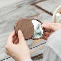 Miroir de poche compact en bois de noyer noir personnalisé avec logo, idéal pour le maquillage et la beauté