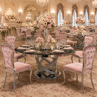 Table ronde de luxe en acier inoxydable argenté pour hôtel, idéale pour les événements et les fêtes