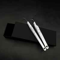 Pince à cils à poignée diamantée noir et blanc pince à cils à pointe pointue en acier inoxydable durable gravée en coeur
