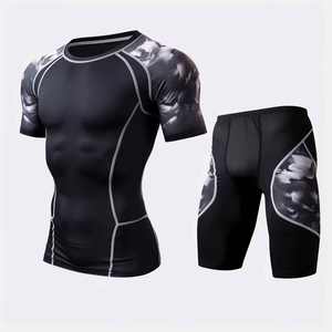 Conjunto Casual de Verano para Hombre de 2 Piezas, Camiseta Transpirable de Manga Corta con Protección Solar y Pantalones Cortos de Compresión Lisos - Product Image 1