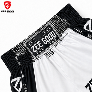 กางเกงมวยไทย MMA สำหรับฝึกซ้อม ยูนิเซ็กซ์  โลโก้ด้านหน้า ผ้าโพลีเอสเตอร์ 100% 180 กรัม ระบายอากาศได้ดี  ชุดฝึกศิลปะการต่อสู้แบบดิจิทัล - Product Image 3