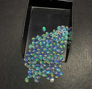 พลอยโอปอลเอทิโอเปียเพลิงสีฟ้าธรรมชาติ33ชิ้น4*6มม. ทรงวงรี10 CT ล็อต IGI อเมทิสต์อัญมณีทรงลูกแพร์อัญมณีหลวม" - Product Image 4