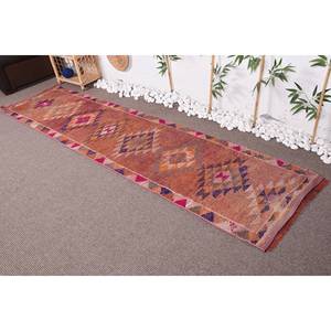 Alfombra Kilim Vintage de 2,5x10 pies en diseño de retazos de lana naranja con respaldo de látex para una decoración cálida y acogedora para el hogar - Product Image 1