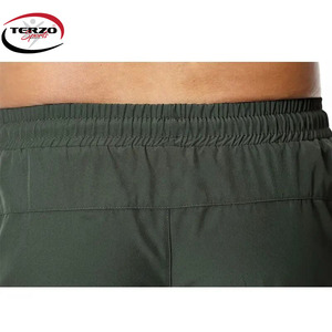 Pantalones cortos de gimnasio con logotipo personalizado, ropa deportiva doble de poliéster de secado rápido para entrenamiento en gimnasio, pantalones cortos de entrenamiento de Fitness de Color sólido con bolsillos teñidos lisos - Product Image 4