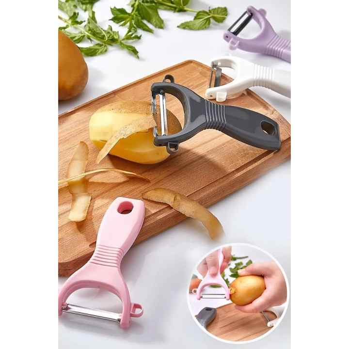 Practical Vegetable and Fruit Peeler. Steel Laser Cut with White Handle. White