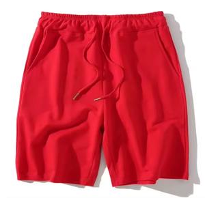 Vente en gros de shorts de plage en stock shorts de course en polyester pour hommes maillots de bain shorts pour hommes logo personnalisé brodé - Product Image 1
