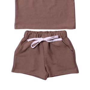 Conjuntos de ropa de verano para niños de boutique al por mayor conjuntos de pantalones cortos de manga corta conjuntos de trajes casuales de algodón de color sólido para niños - Product Image 3