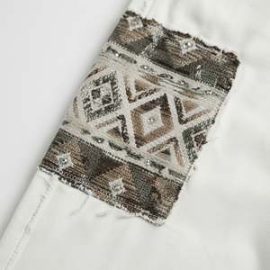 กางเกงผ้าฝ้ายทรงหลวมสำหรับผู้ชาย รุ่น Heavyweight แบบสั่งทำพิเศษ ลายกราฟิก 3 มิติ สไตล์ Distressed ไร้รอยต่อ สตรีทแวร์ Y2K ทรงหลวม กระดุมสูง - Product Image 4