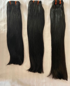 Venta al por mayor de pelo crudo ondulado a máquina de trama de cabello humano vendedor Super doble dibujado recto Natural trama virgen 100% pelo crudo vietnamita - Product Image 1