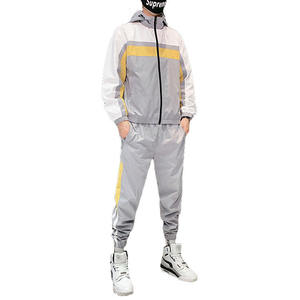 Chaqueta Deportiva Cortavientos Personalizable para Hombre, con Bloques de Color, Cremallera, Capucha, 100% Algodón, Elástica en Cuatro Direcciones - Product Image 4